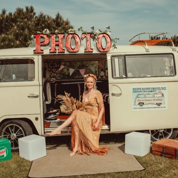 The vintage VW camper photo booth dressed for a wedding