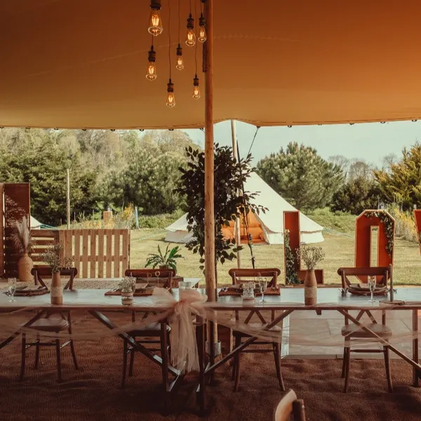 A wedding reception laid out under the Bedouin stretch tent